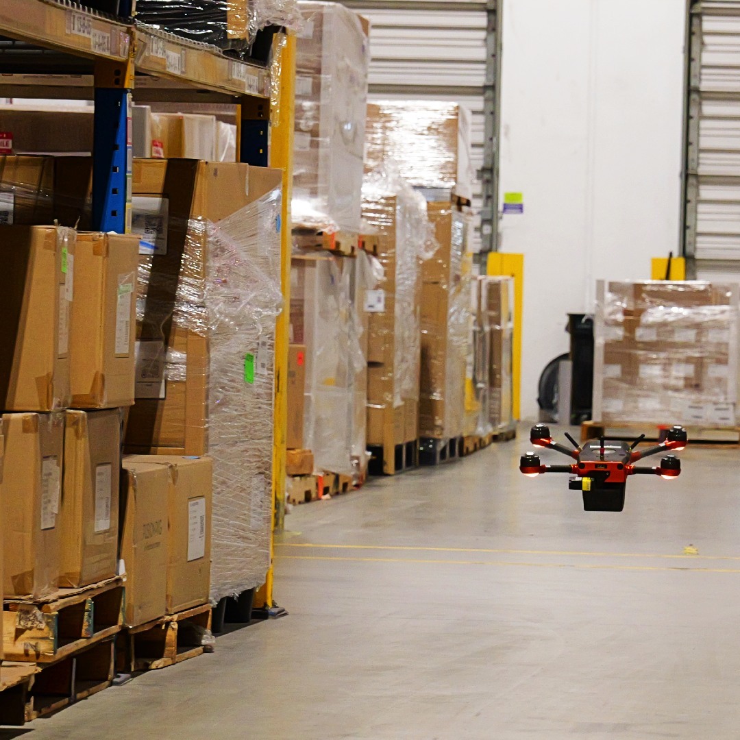 A Corvus One autonomous inventory drone scans pallets of inventory at Dermalogica's global headquarters in Carson, CA.